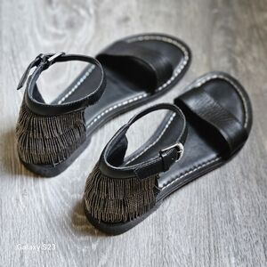 Bernardo Women's Taci Flat Sandal Black Leather Closed Heel Metal Fringe